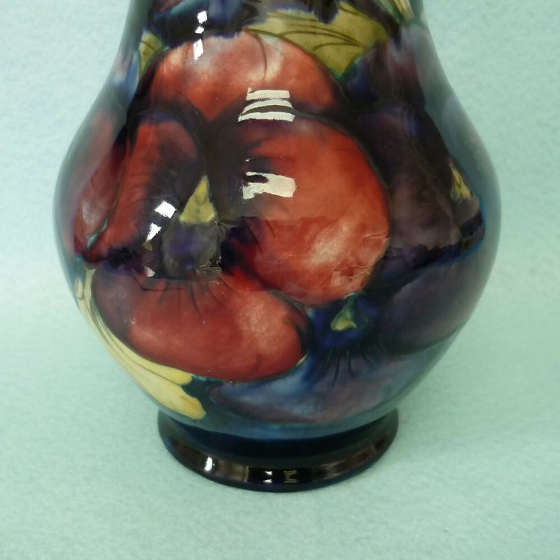 A Moorcroft Vase (8.18inch) c1918-1926. Pansy Pattern by William Moorcroft.