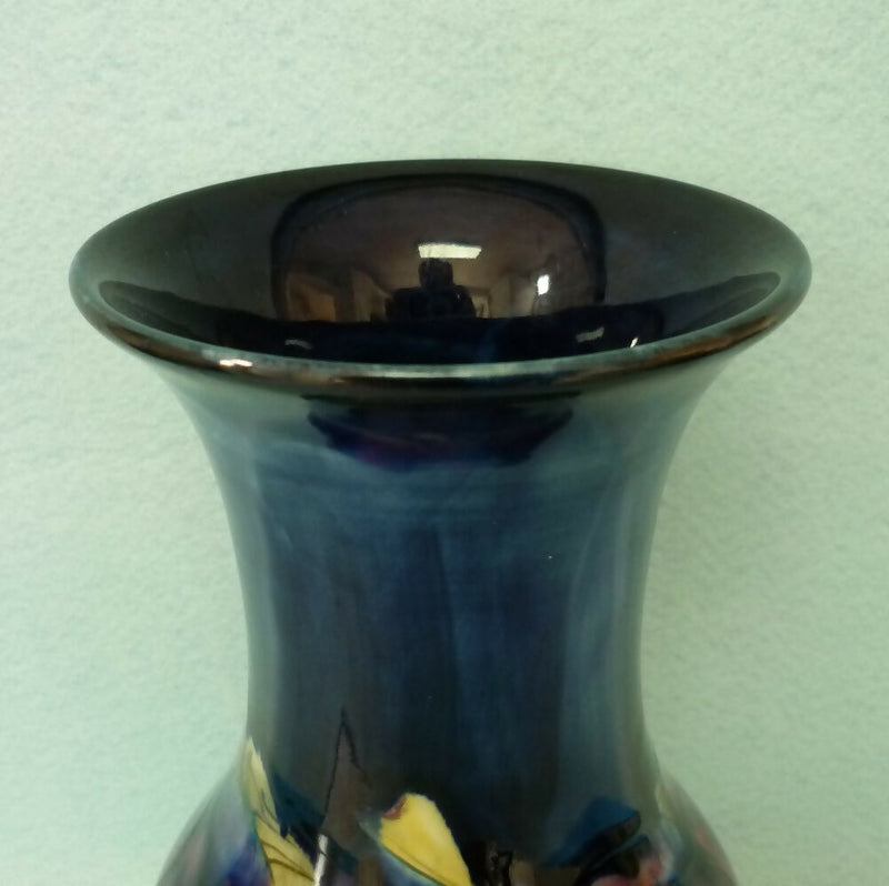 A Moorcroft Vase (8.18inch) c1918-1926. Pansy Pattern by William Moorcroft.