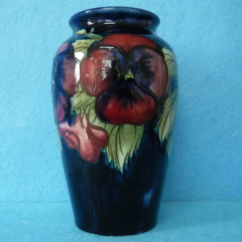 A Moorcroft Vase (5.03inch) c1918-26. Pansy Pattern by William Moorcroft.