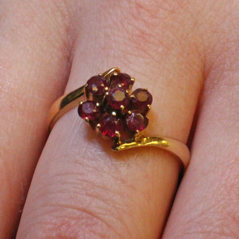 14ct gold ruby 2 tier flower head crossover ring