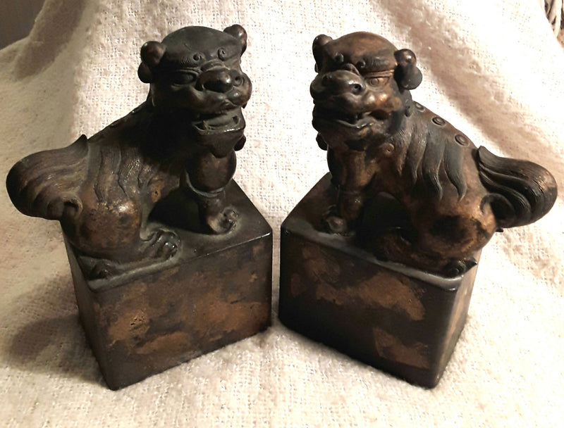 A Pair Of Solid Bronze Gilded Fo Dog Seals.
