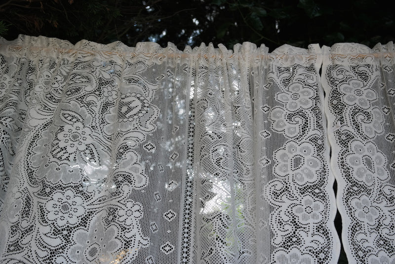 An Antique design pair of Victorianna white Cotton Lace Curtain Panels - 60 x 90 Inches- Ready-made