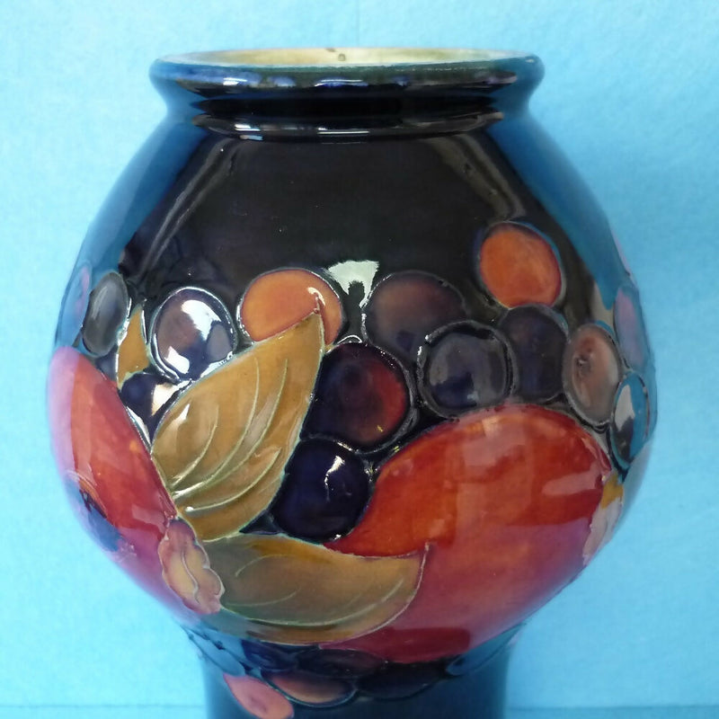 Moorcroft Vase (9.84 inch). Pomegranate Design by William Moorcroft.