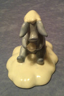Royal Doulton Winnie The Pooh figure. Royal Doulton Eeyore Made a wintry wish figure. WP44