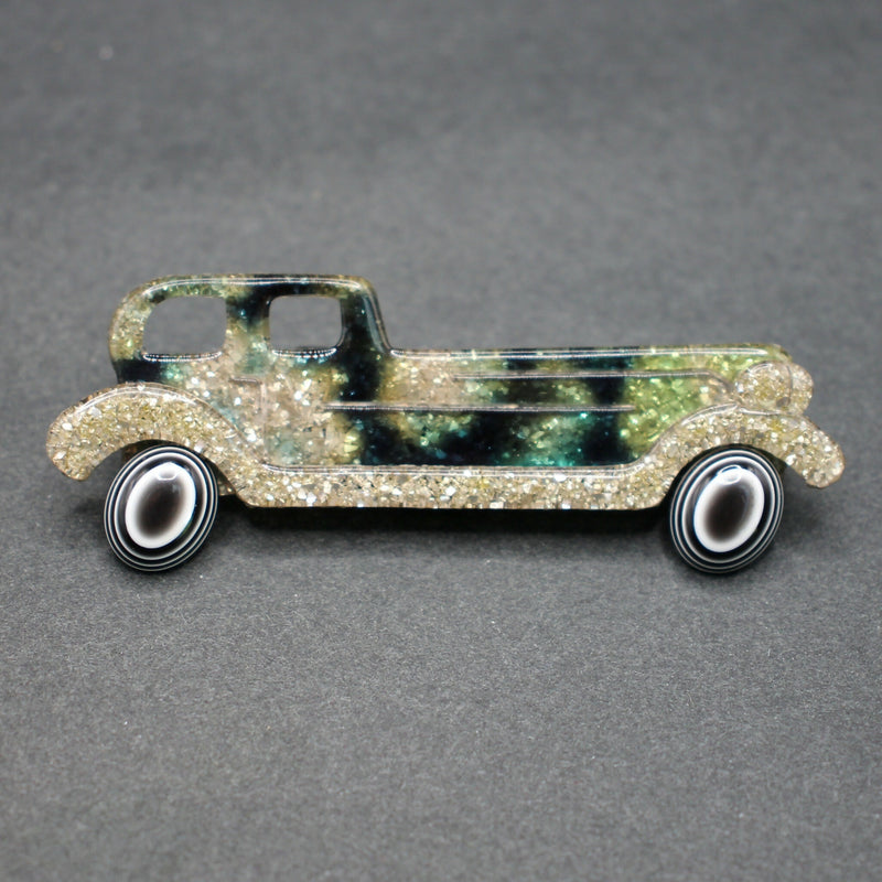 Lea Stein green-gold limousine brooch