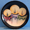 A Moorcroft Pin Dish in the Candlelight Design by Nicola Slaney