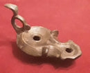 A Roman Bronze Ring Handled Oil Lamp.