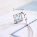 18ct White Gold Blue Topaz & Diamond Pendant