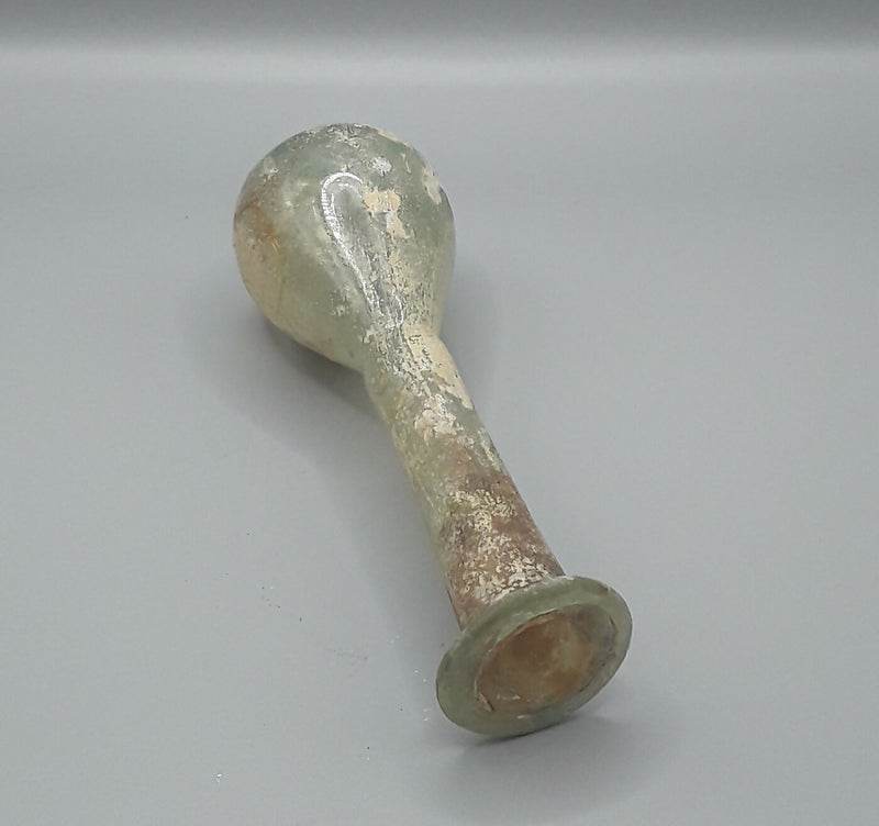 A Roman Small Hand Blown Glass Unguentarium Flask.