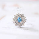18ct White Gold Blue Topaz & Diamond Cluster Ring