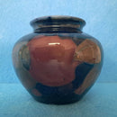 A Moorcroft Vase c1918-1926 in the Pomegranate Design by William Moorcroft