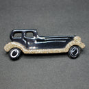 Lea Stein black-gold limousine brooch