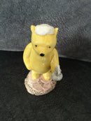 Royal Doulton - Winnie The Pooh figurine Royal Doulton Pooh lights the candle figurine WP11