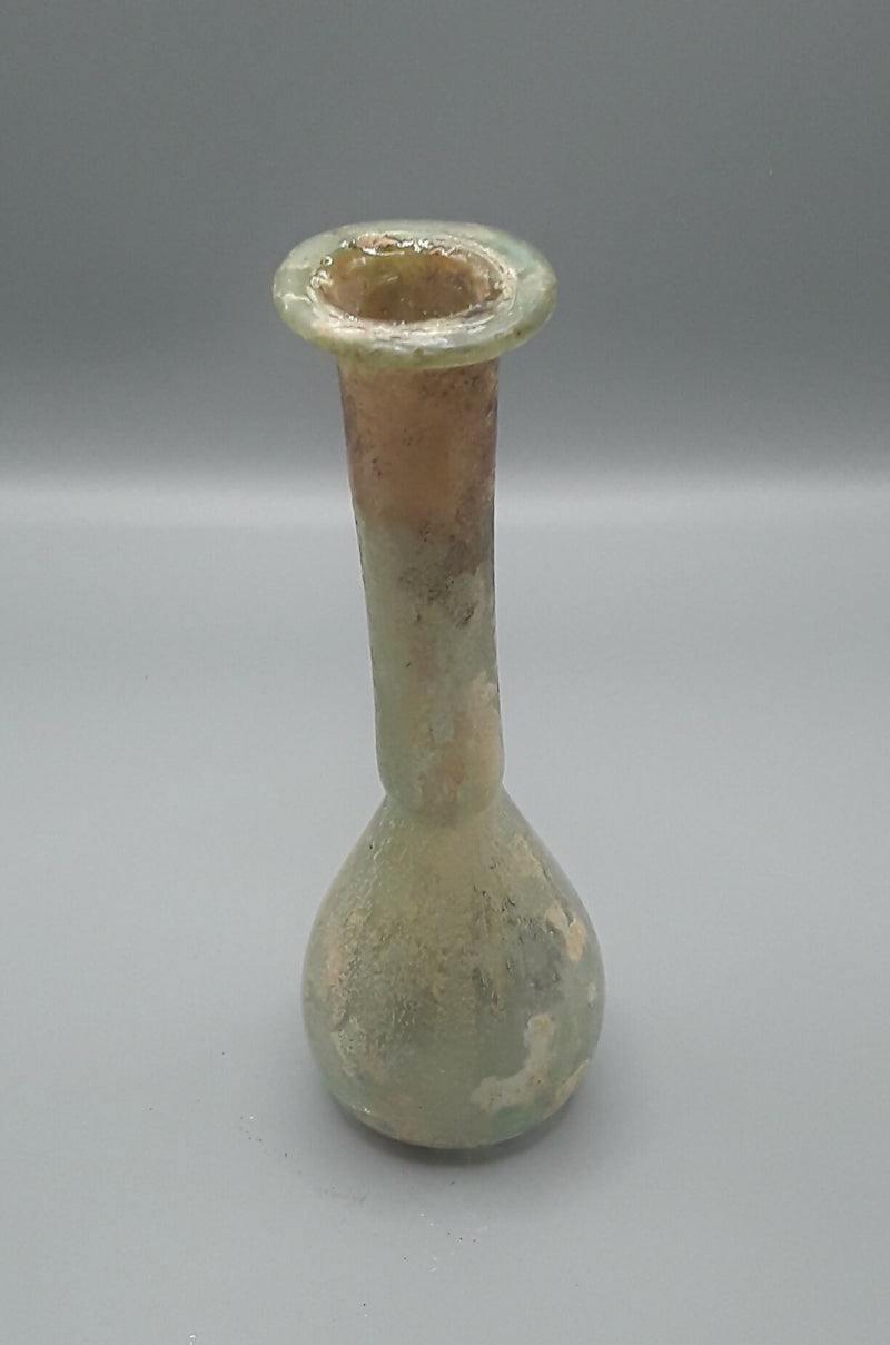 A Roman Small Hand Blown Glass Unguentarium Flask.