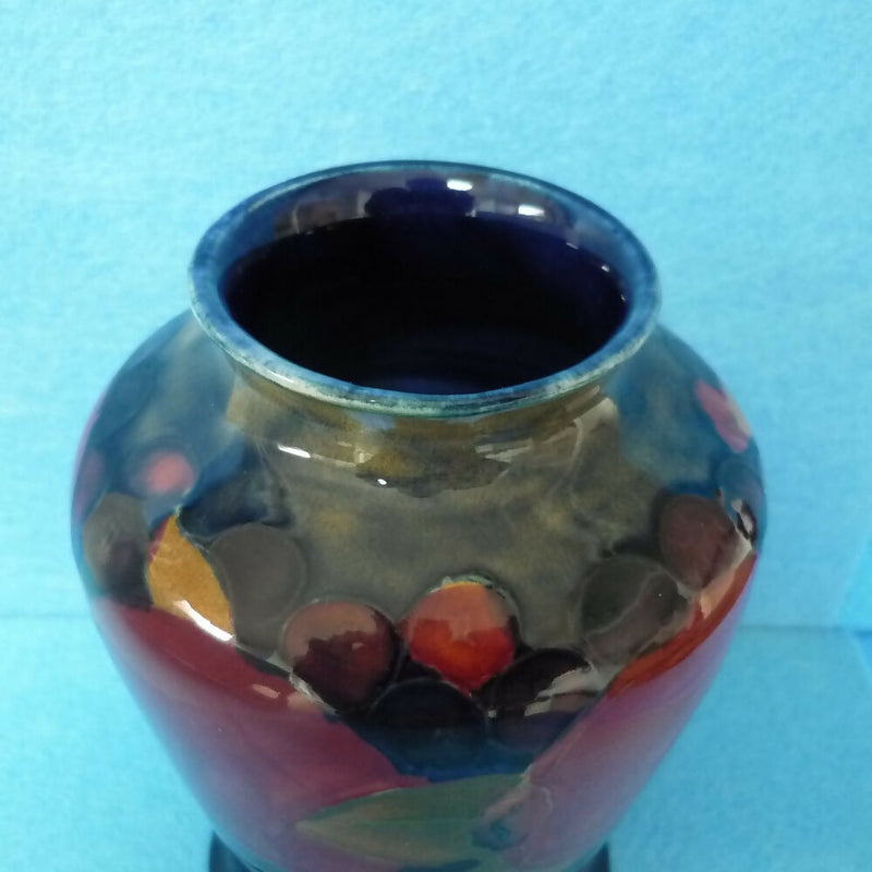 Moorcroft Vase (5.15 inch). Pomegranate Design by William Moorcroft.