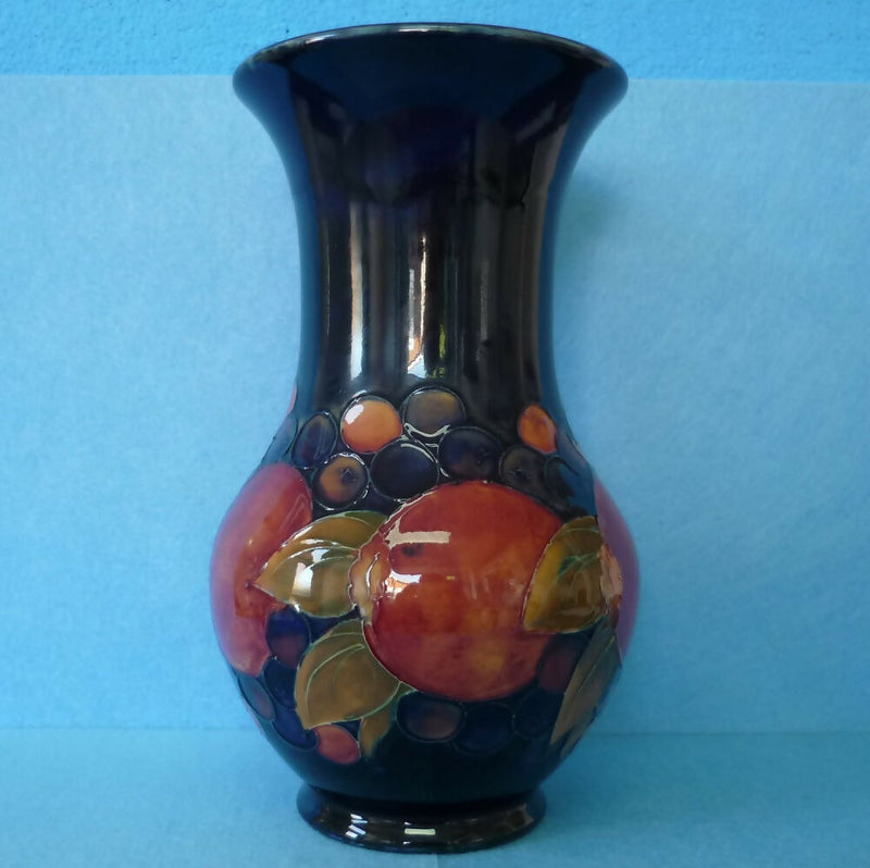 Moorcroft Vase (9.84 inch). Pomegranate Design by William Moorcroft.