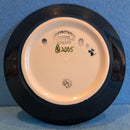 A Moorcroft Pin Dish in the Candlelight Design by Nicola Slaney