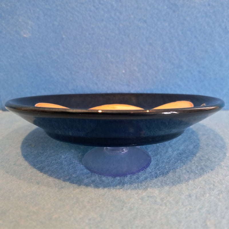 A Moorcroft Pin Dish in the Candlelight Design by Nicola Slaney