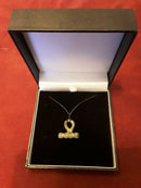 A Celtic Bronze Toggle Fastener Pendant.