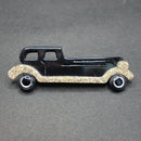 Lea Stein black-gold limousine brooch