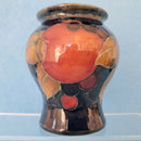 A Moorcroft Vase in the Pomegranate Design by William Moorcroft