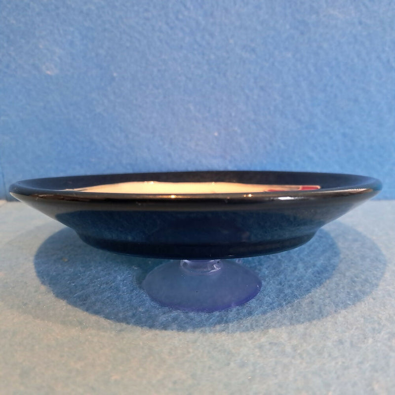 A Moorcroft Pin Dish in the Candlelight Design by Nicola Slaney