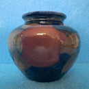 A Moorcroft Vase c1918-1926 in the Pomegranate Design by William Moorcroft