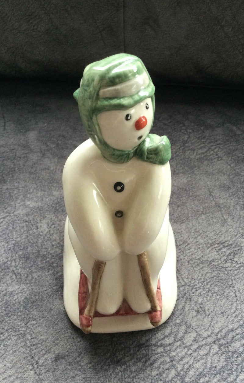 Royal Doulton - Snowman Figurine Royal Doulton - Tobogganing Snowman figurine Boxed