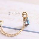 18ct Blue Topaz Pendant on 9ct Chain