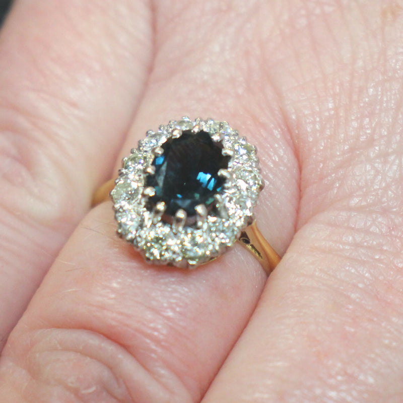 18ct-gold-sapphire-and-diamond-cluster-ring-25c021a