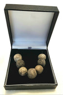 A Restrung Mammoth Bone Seven Beaded Pendant.