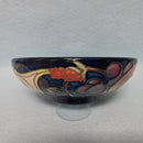 A Moorcroft Footed Bowl in the Queen's Choice Design by Emma Bossons