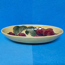 A Moorcroft Oval Bowl in the Hibiscus Design by Walter Moorcroft