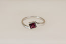 Elegant Sterling Silver Rhodolite Garnet Twist Ring