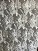 Beautiful Clematis Flower Lace Panelling off the roll sold per metre to finish in Bone 130cms wide