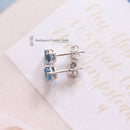 18ct White Gold Blue Topaz Earrings