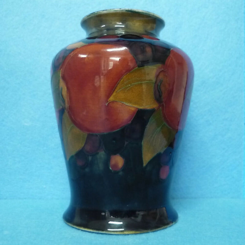 Moorcroft Vase (5.15 inch). Pomegranate Design by William Moorcroft.