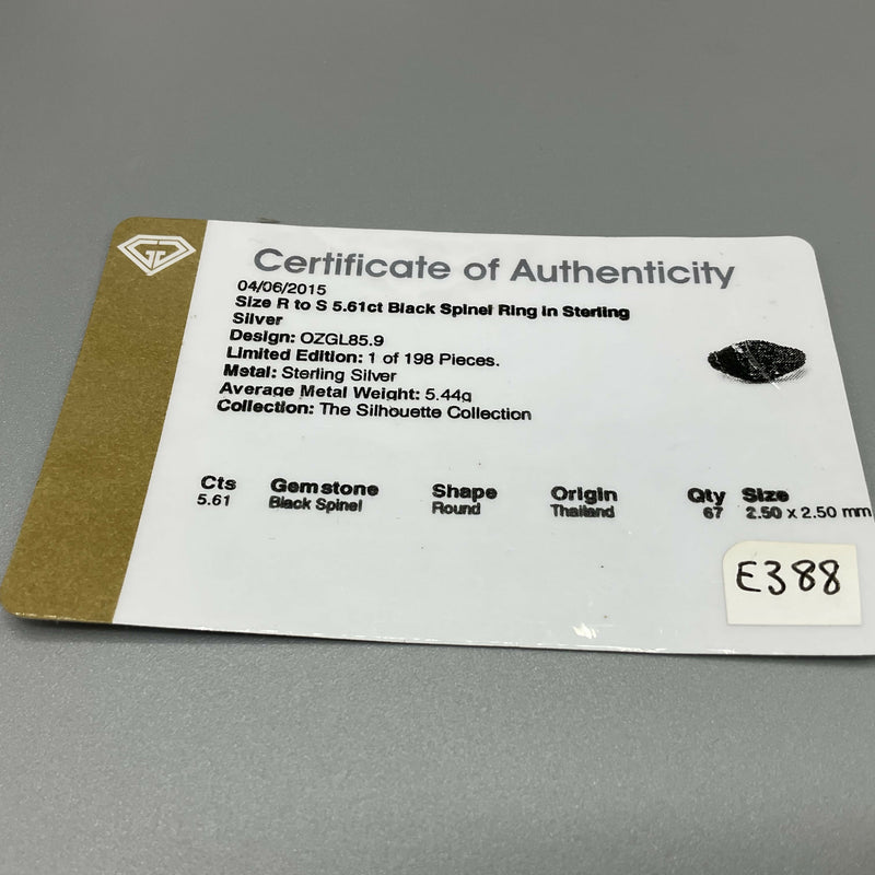 Silver and black spinel ring