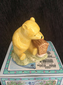 Royal Doulton Winnie The Pooh figurine Royal Doulton Winnie The Pooh and the far sized basket WP19