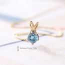 18ct Blue Topaz Pendant on 9ct Chain