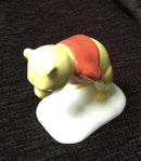 Royal Doulton - Winnie The Pooh figurine Royal Doulton Winnie The Pooh and the paw marks 70th Anniversary WP3