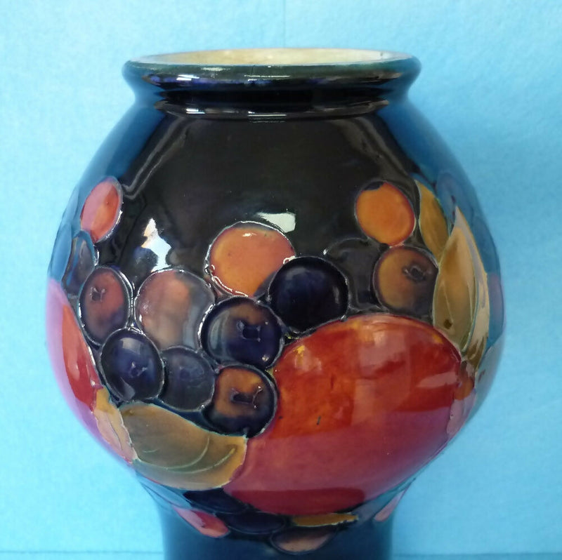 Moorcroft Vase (9.84 inch). Pomegranate Design by William Moorcroft.