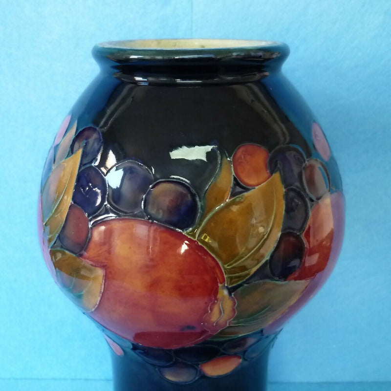 Moorcroft Vase (9.84 inch). Pomegranate Design by William Moorcroft.