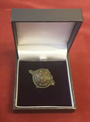 A Roman Umbanate Enamelled Cloak Brooch.