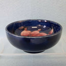 A Small Moorcroft Footed Bowl in the Freesia Design by Walter Moorcroft