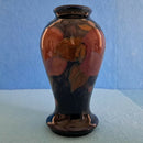 A Moorcroft Vase c1918-1926 in the Pomegranate Design by William Moorcroft