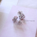 18ct White Gold Ruby & Diamond Cluster Earrings by Luke Stockley London