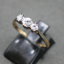 18ct gold and platinum c0.55ct diamond trilogy ring