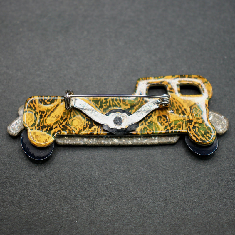 Lea Stein black-gold limousine brooch
