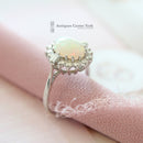 18ct White Gold Opal & Diamond Oval Cluster Ring